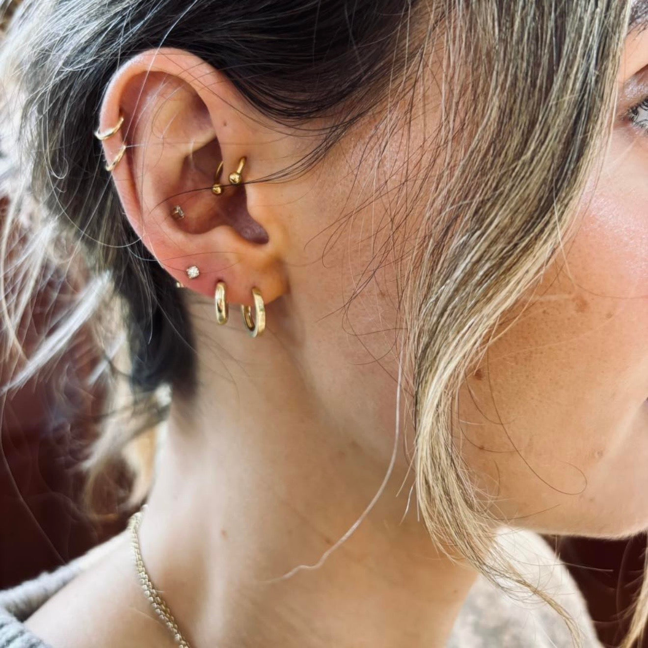 Gold Huggies earrings