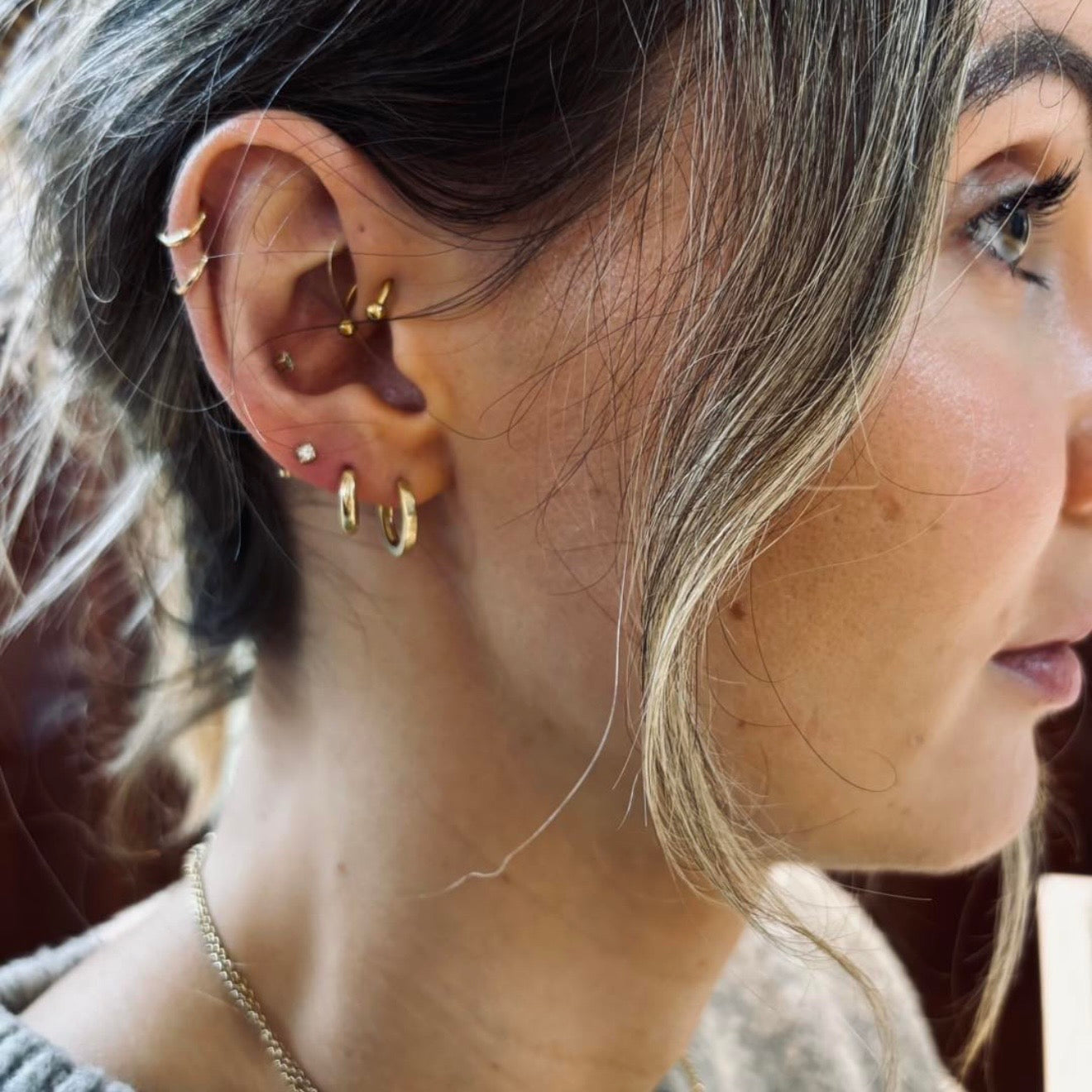 Gold Huggies earrings